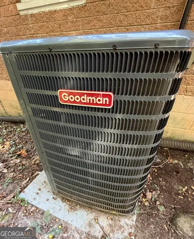 a view of a roof deck with a floor to ceiling window