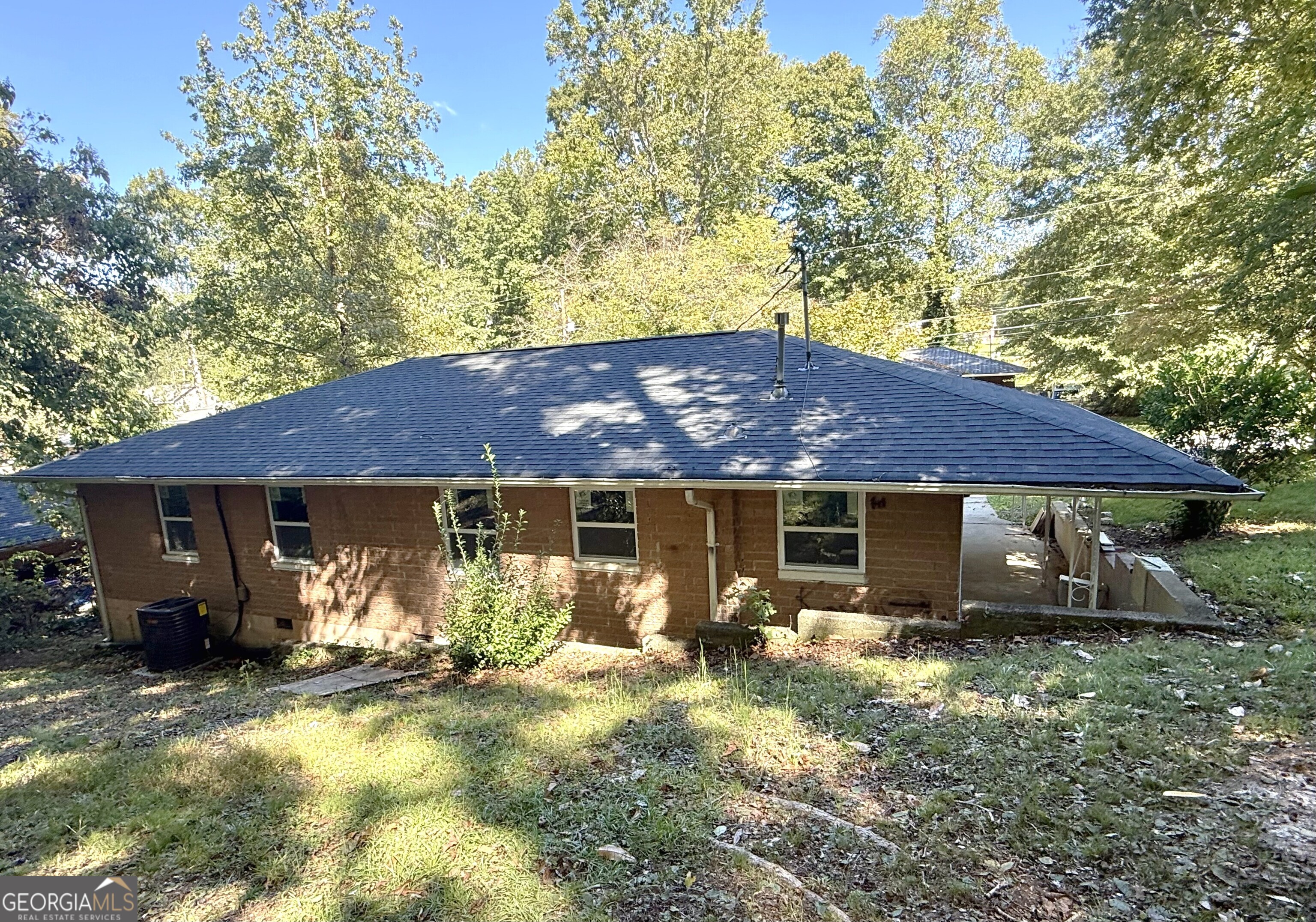 226 Poplar Street Toccoa, GA 30577 - Photo 16 of 17 a view of a house with backyard