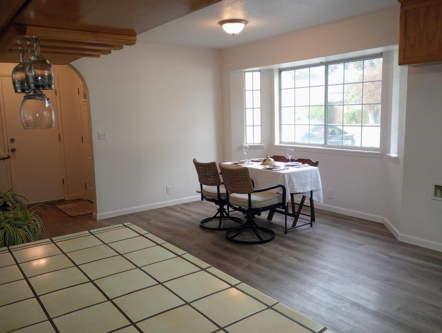 1432 Don Pedro Road Ceres, CA 95307 - Photo 13 of 56 a dining room with furniture and window