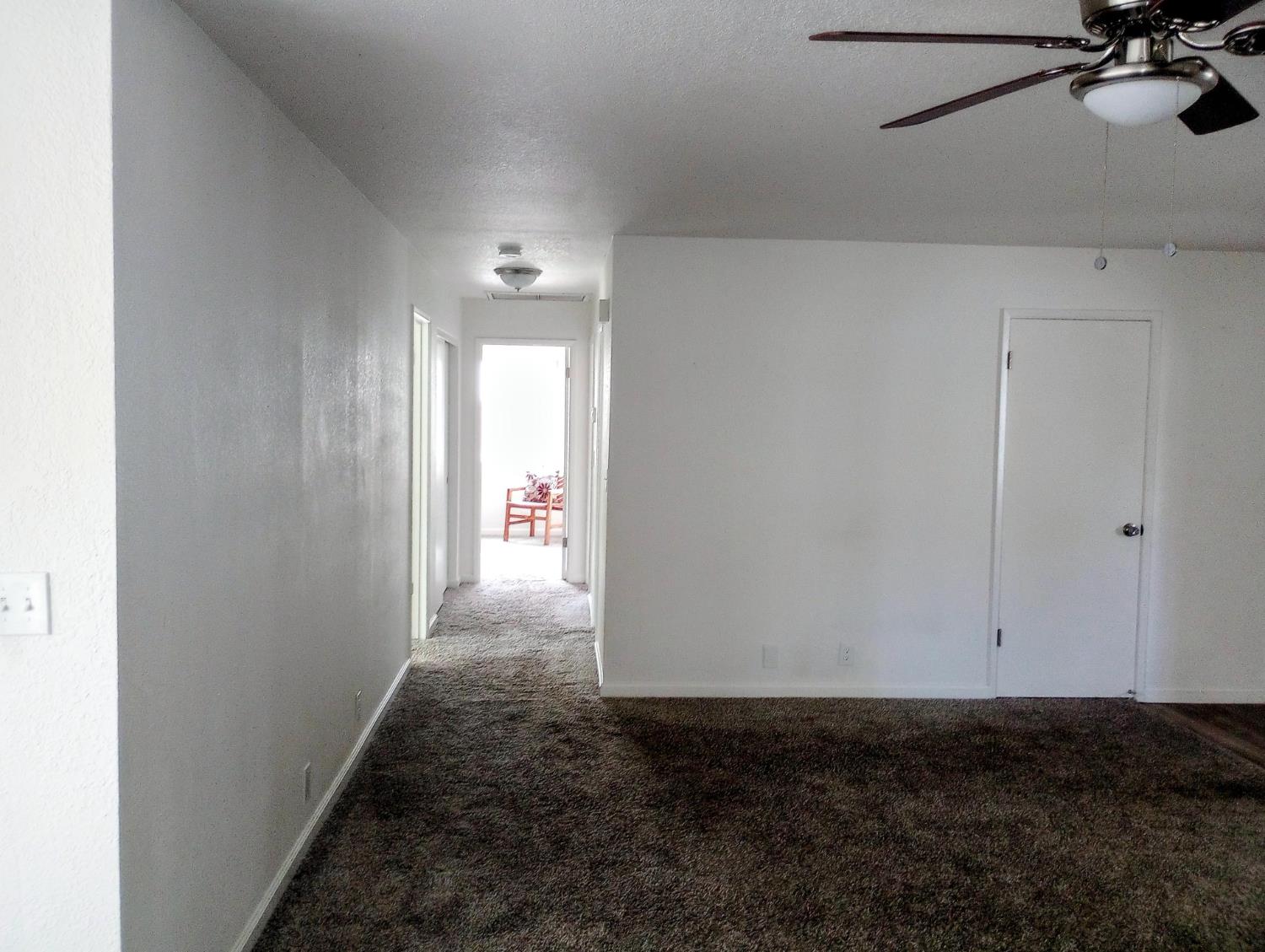 1432 Don Pedro Road Ceres, CA 95307 - Photo 19 of 56 a view of a hallway