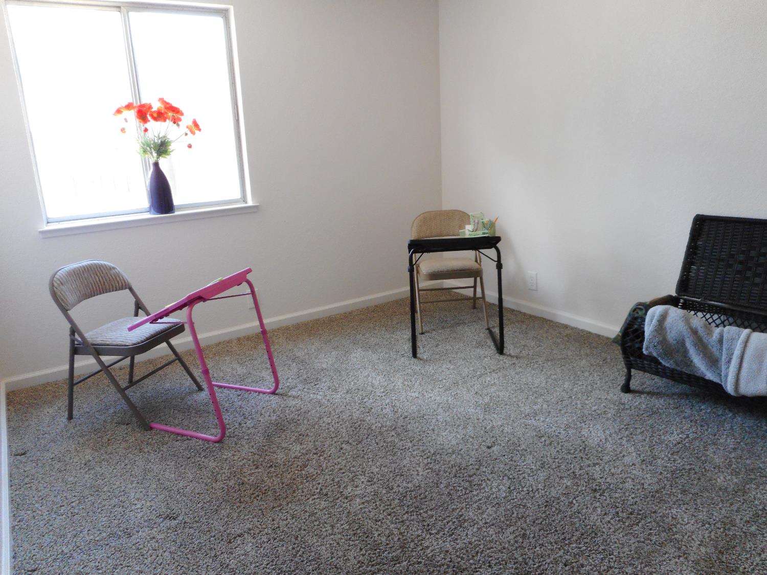 1432 Don Pedro Road Ceres, CA 95307 - Photo 32 of 56 a living room with furniture and a chair