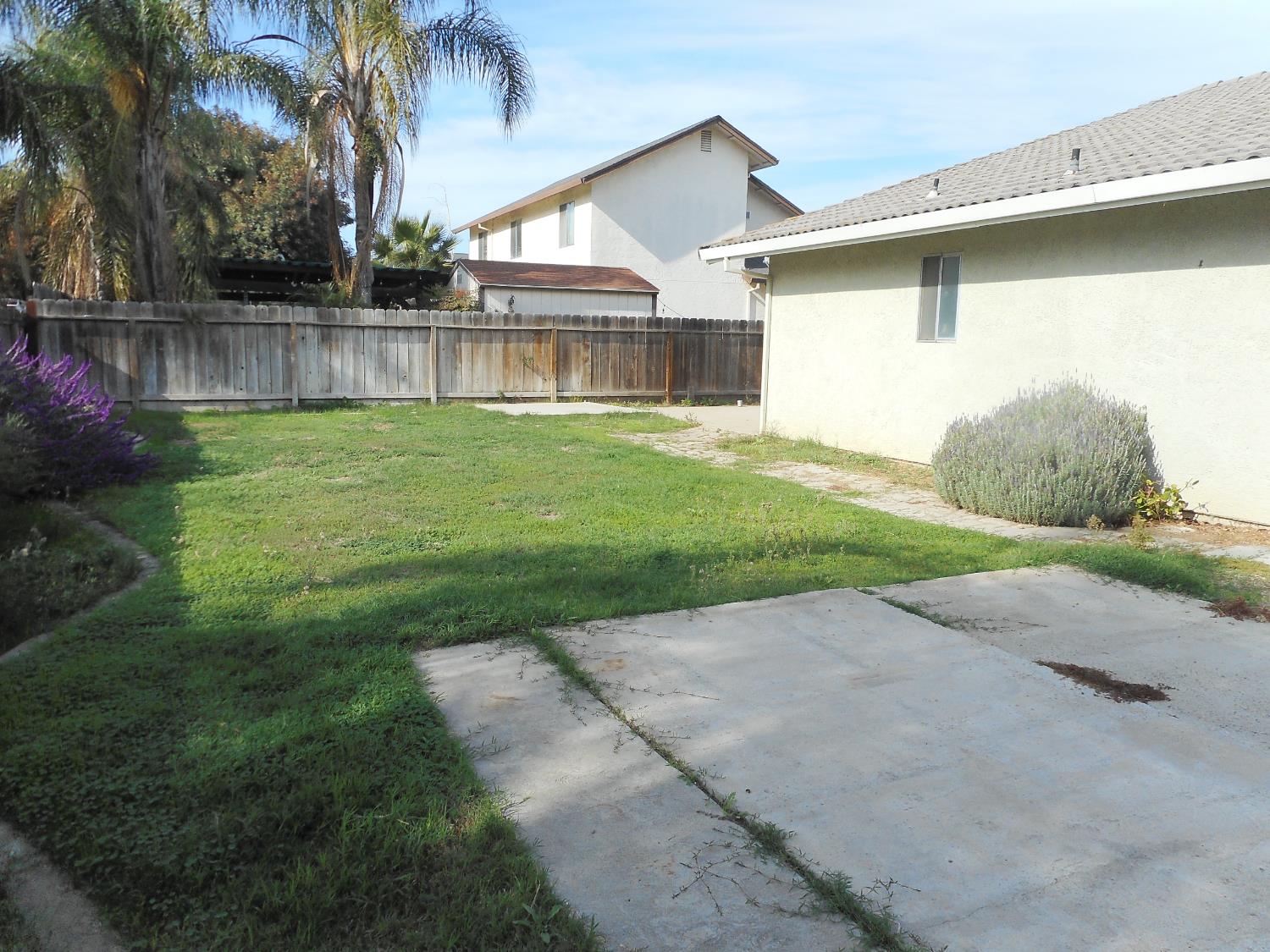 1432 Don Pedro Road Ceres, CA 95307 - Photo 42 of 56 a view of a house with a yard