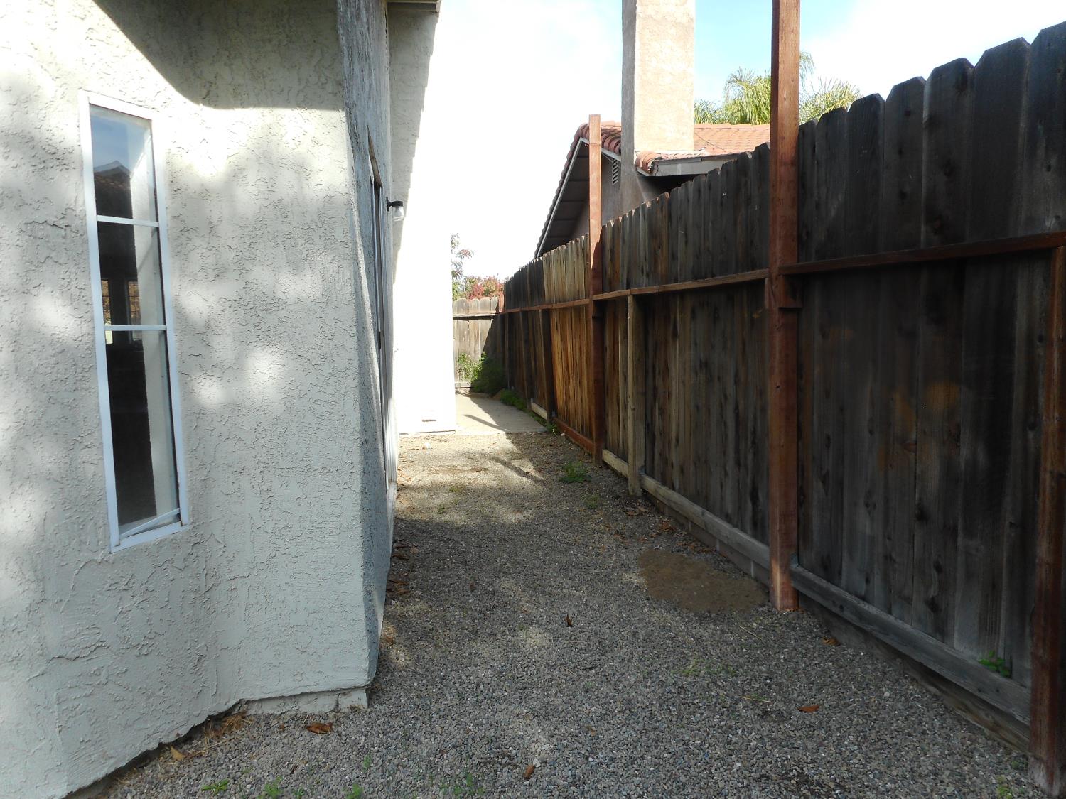 1432 Don Pedro Road Ceres, CA 95307 - Photo 50 of 56 a view of a wooden door