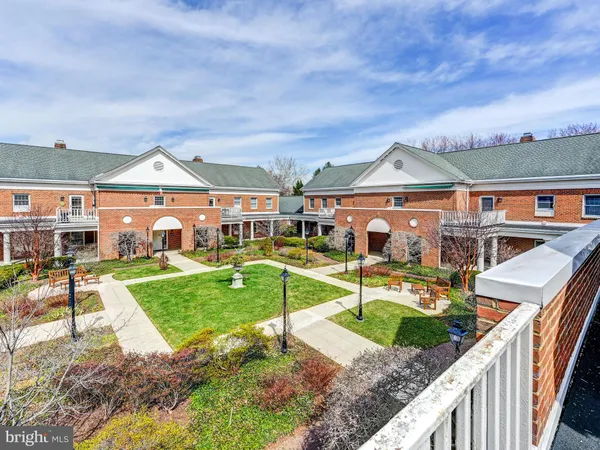 an aerial view of a house with a garden and plants