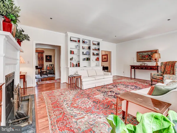 a living room with furniture and a rug