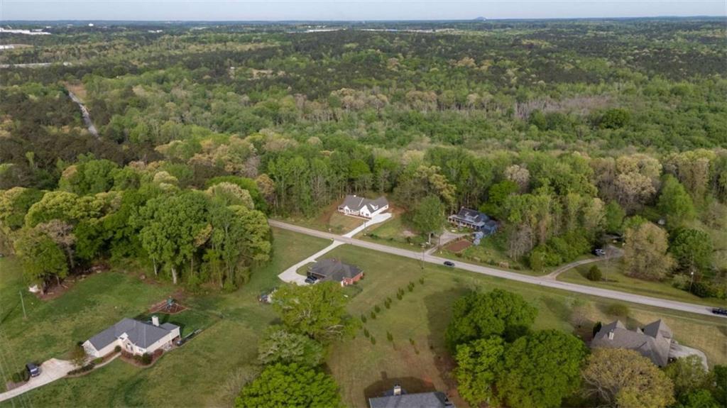 11691 Hazelbrand Road Northeast Covington, GA 30014 - Photo 48 of 53 an aerial view of a houses with a yard