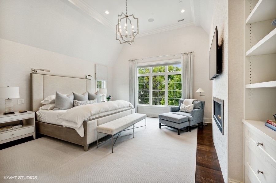 488 Park Avenue Glencoe, IL 60022 - Photo 18 of 32 a bedroom with a bed couch and a window