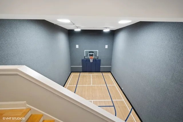 a living room with fireplace furniture and a flat screen tv