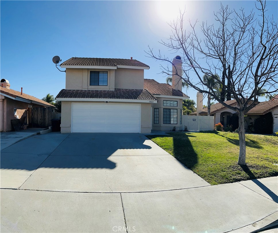 39824 Creative Drive Temecula, CA 92591 - Photo 1 of 1 a front view of a house with a yard