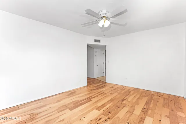 a kitchen with stainless steel appliances granite countertop a refrigerator sink and cabinets