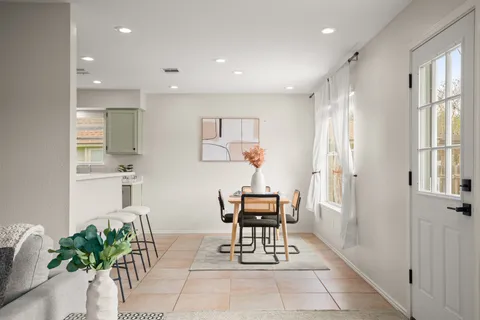 a view of kitchen with furniture and potted plant