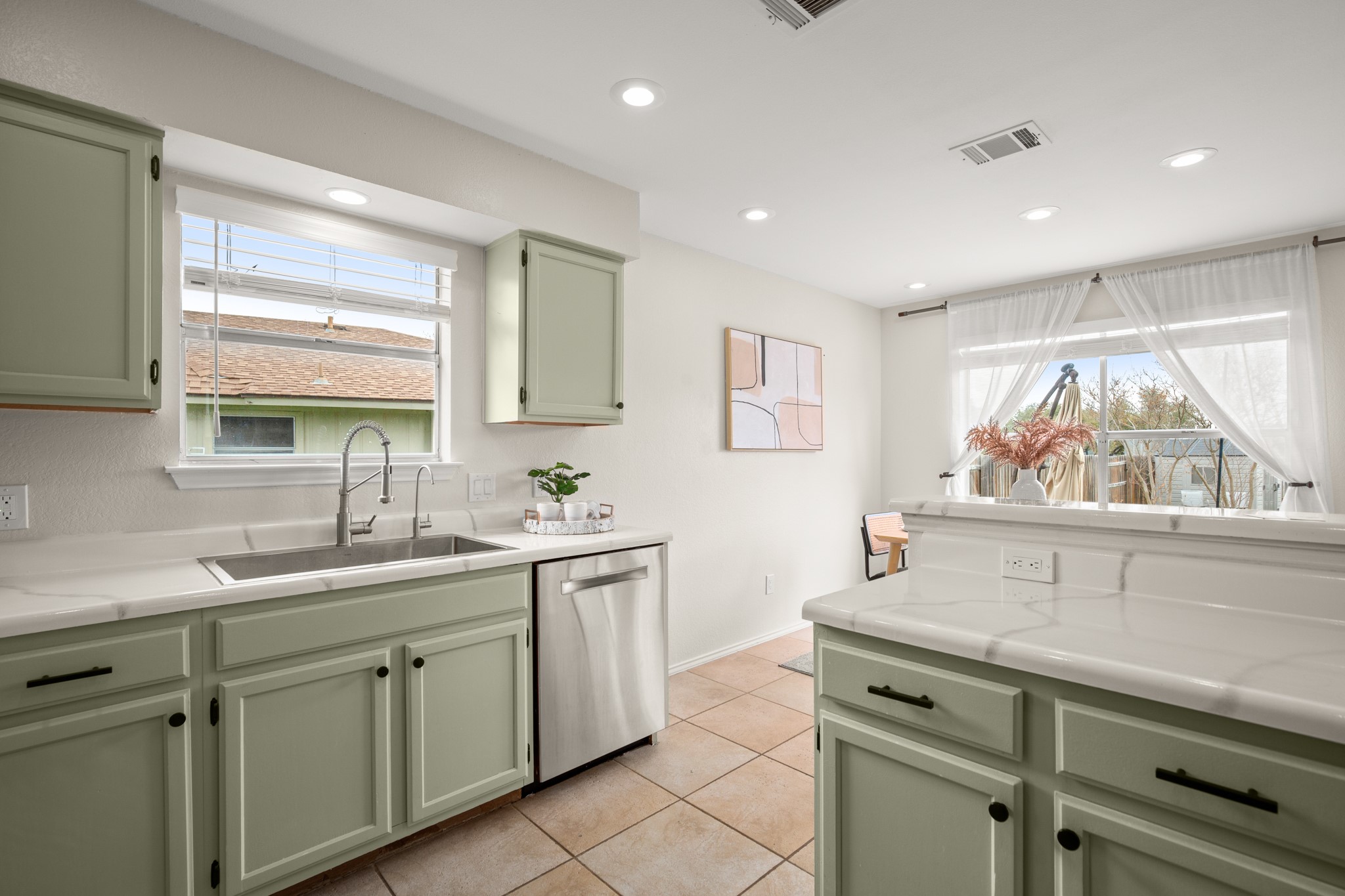 1302 Rambling Trail Cedar Park, TX 78613 - Photo 14 of 26 a kitchen with a sink and large window