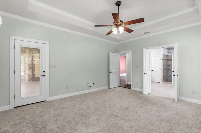 a bathroom with a granite countertop sink a mirror and a shower