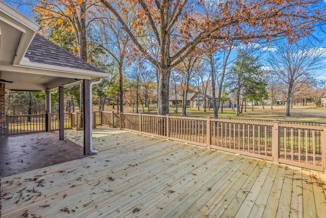 a view of a patio with a yard