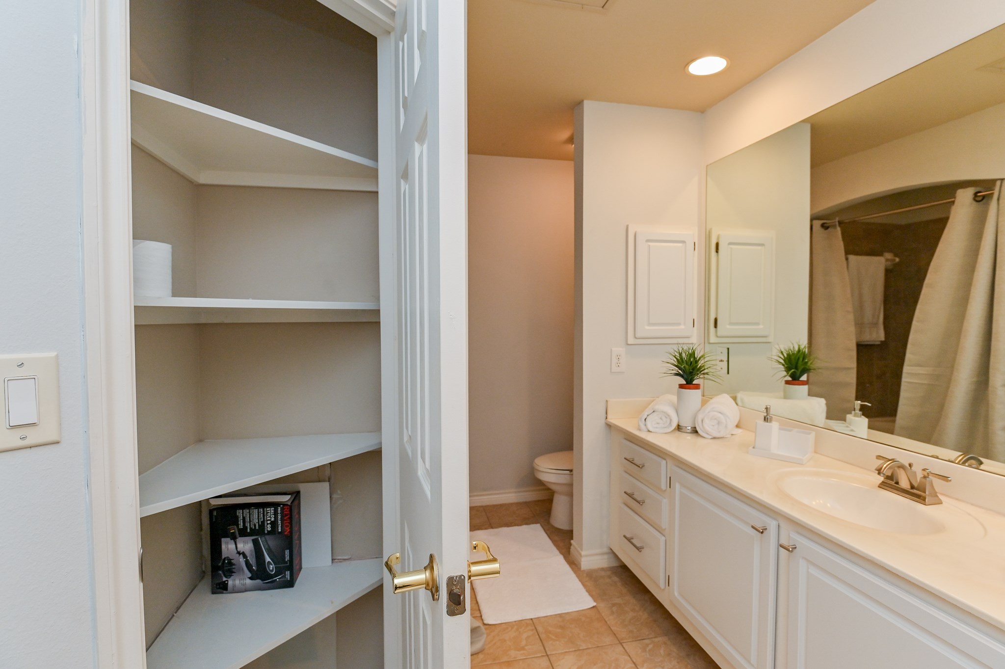 2400 McCue Road, Unit 443 Houston, TX 77056 - Photo 17 of 31 a spacious bathroom with a double vanity sink a mirror and a shower