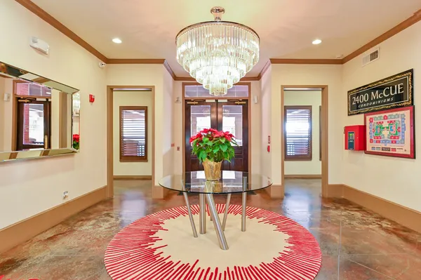 a view of a big room with windows