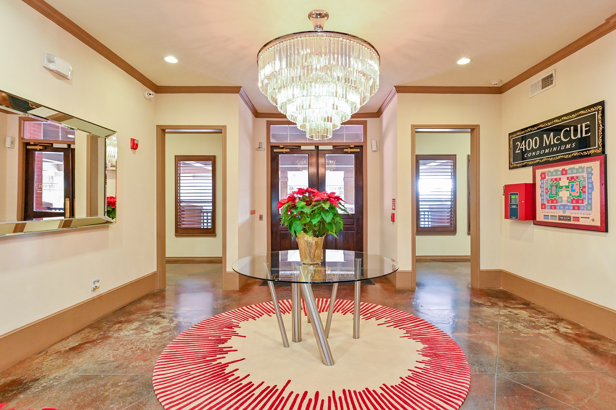 2400 McCue Road, Unit 443 Houston, TX 77056 - Photo 23 of 31 a living room with furniture and a chandelier