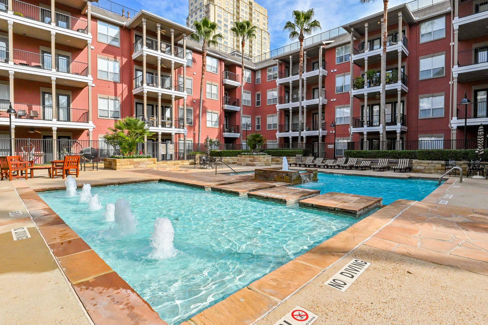 2400 McCue Road, Unit 443 Houston, TX 77056 - Photo 27 of 31 a front view of building with outdoor seating