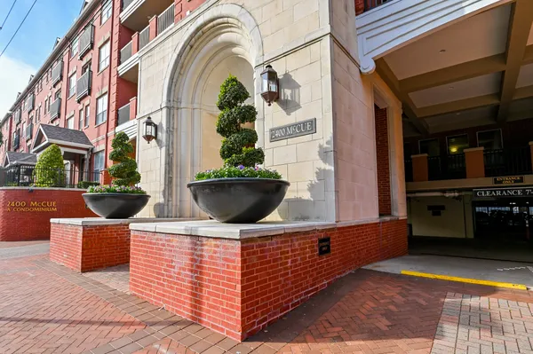 a view of a building with a tree