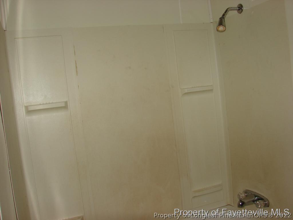 980 Carroll Store Road Autryville, NC 28318 - Photo 14 of 17 a bathroom with a shower