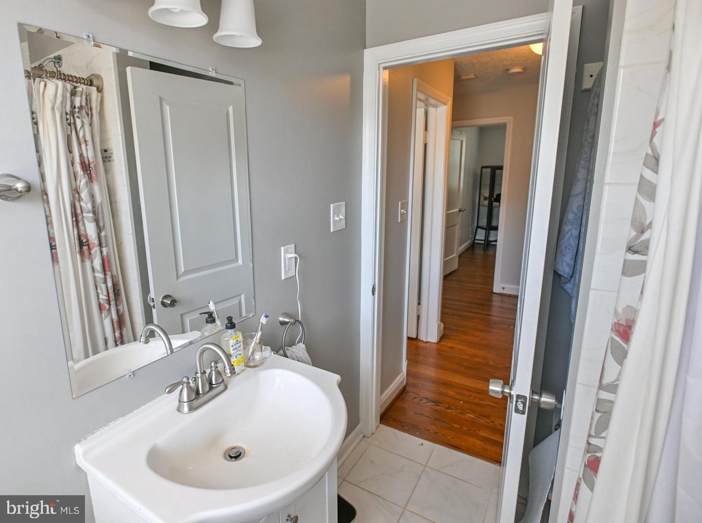 8321 Byington Road Towson, MD 21286 - Photo 14 of 28 a bathroom with a sink and a mirror