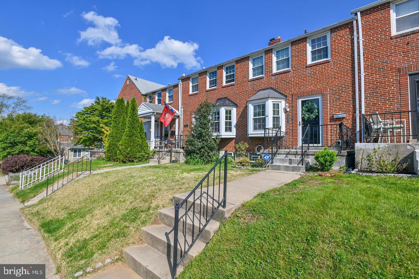 8321 Byington Road Towson, MD 21286 - Photo 2 of 28 a front view of house with yard and green space