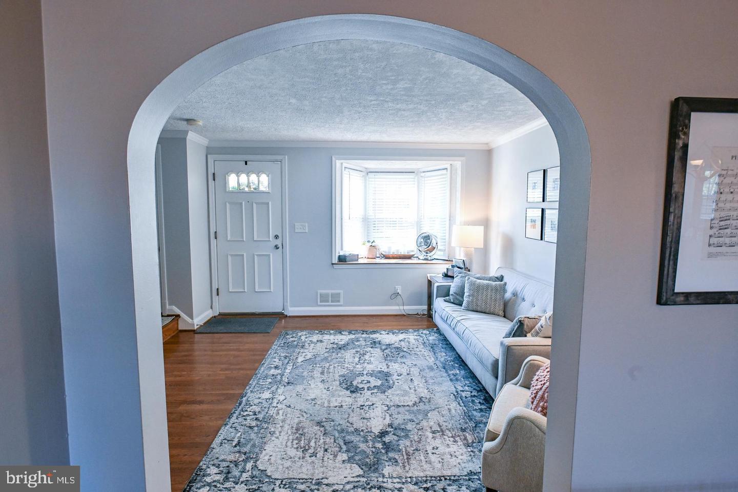8321 Byington Road Towson, MD 21286 - Photo 5 of 28 a living room with furniture and a rug