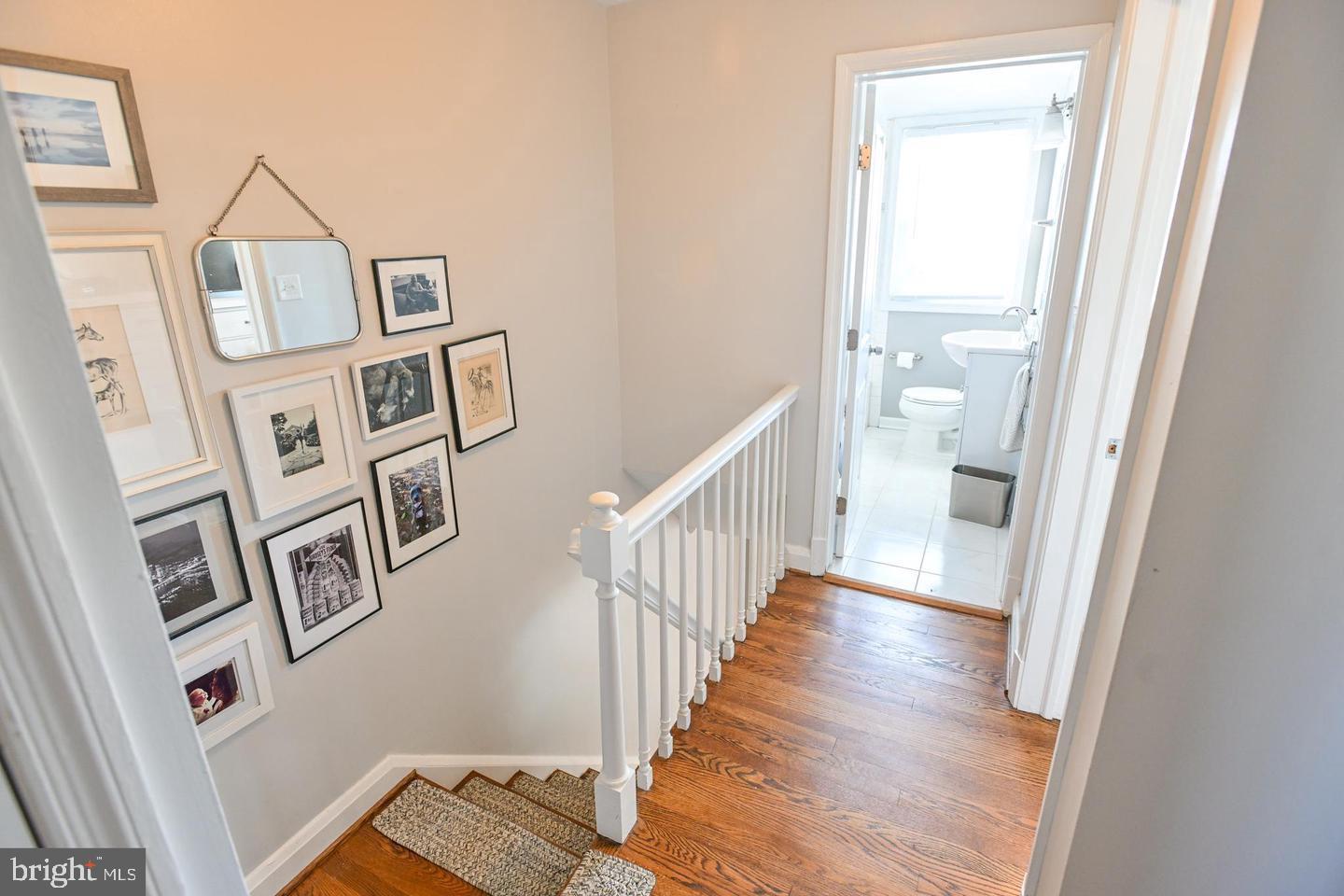 8321 Byington Road Towson, MD 21286 - Photo 10 of 28 a view of a hallway with wooden floor and entryway