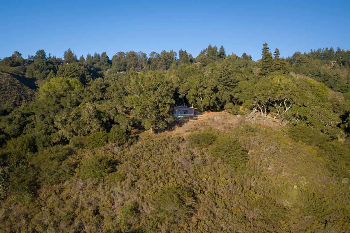 0 Hecker Pass Road Watsonville, CA 95076 - Photo 11 of 25 a view of a yard with a tree in the background