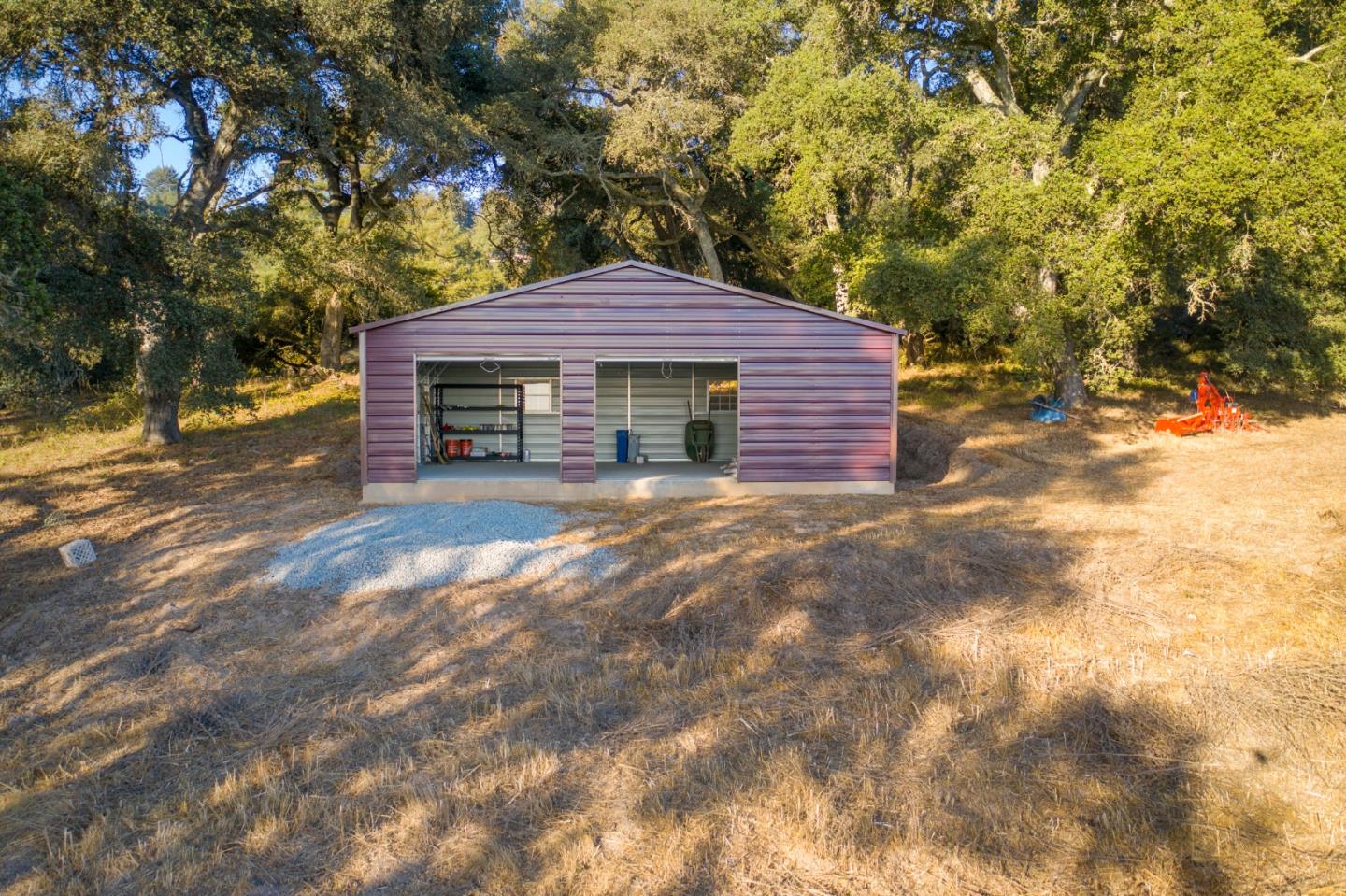 0 Hecker Pass Road Watsonville, CA 95076 - Photo 16 of 25 a front view of a house with a garden