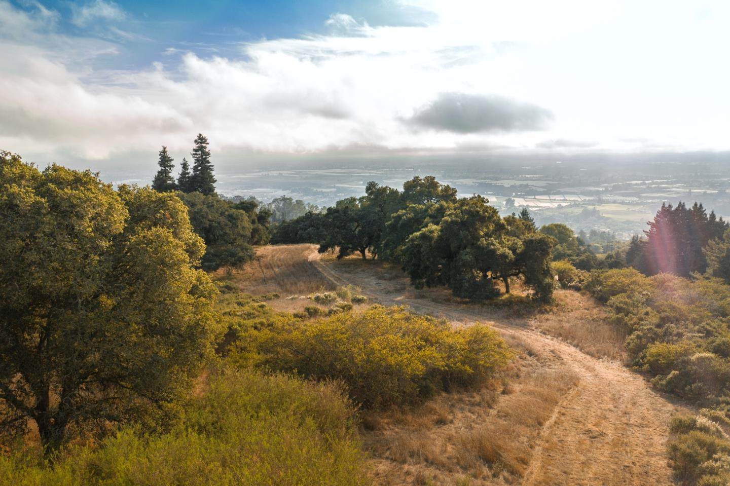 0 Hecker Pass Road Watsonville, CA 95076 - Photo 2 of 25 a view of a lake with a city