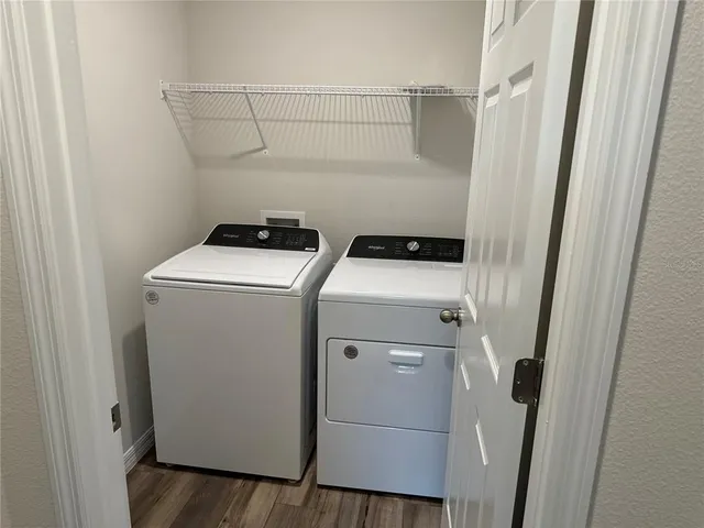 a utility room with dryer and washer