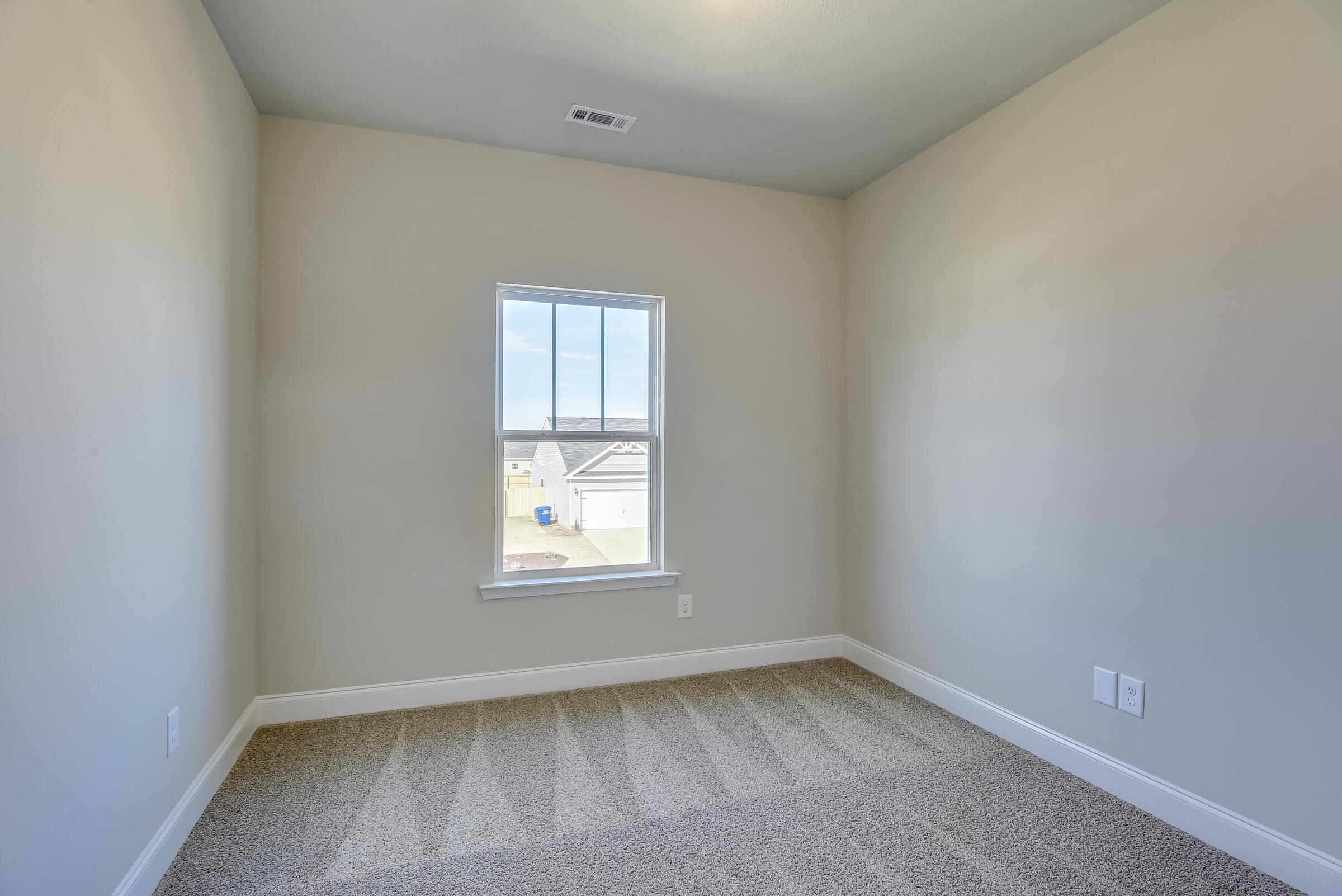 22 Orchard Circle Edgefield, SC 29824 - Photo 8 of 11 an empty room with a window