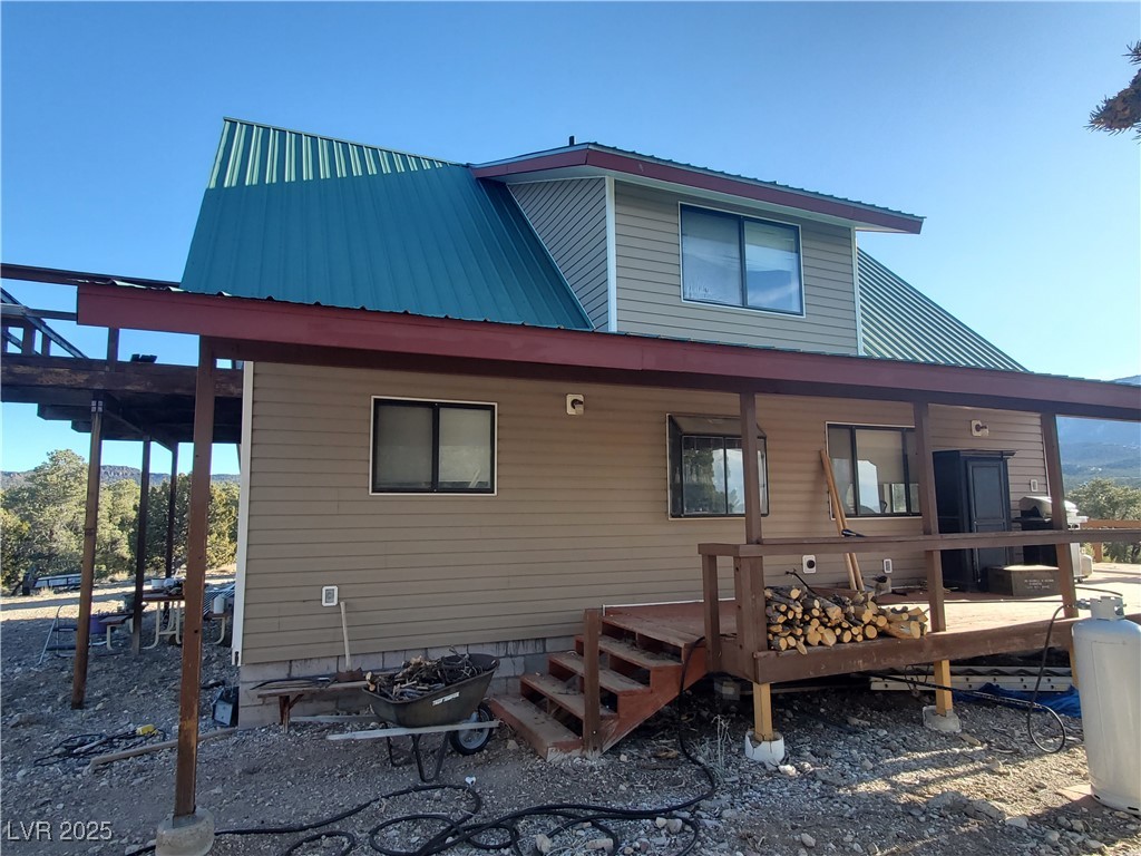 1281 Meadow Lane Pioche, NV 89043 - Photo 31 of 34 Back of house featuring metal roof