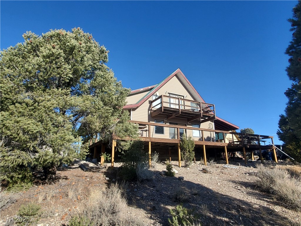 1281 Meadow Lane Pioche, NV 89043 - Photo 32 of 34 Back of house featuring a deck