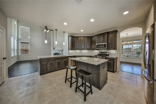 a kitchen with a sink cabinets and counter space