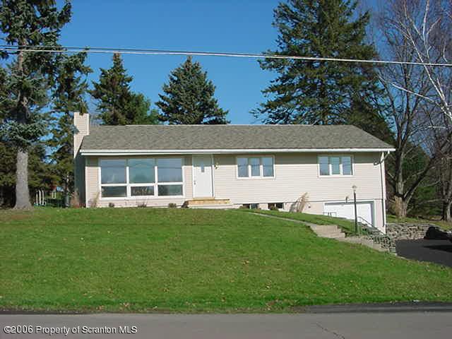 20 Mile Road Tunkhannock, PA 18657 - Photo 1 of 7 a house view with a garden space