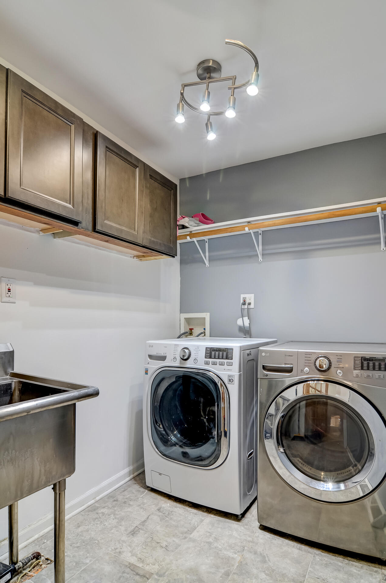 2212 Elm Tree Lane Crown Point, IN 46307 - Photo 11 of 33 a utility room with sink dryer and washer