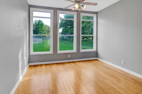 a view of a room with a large window