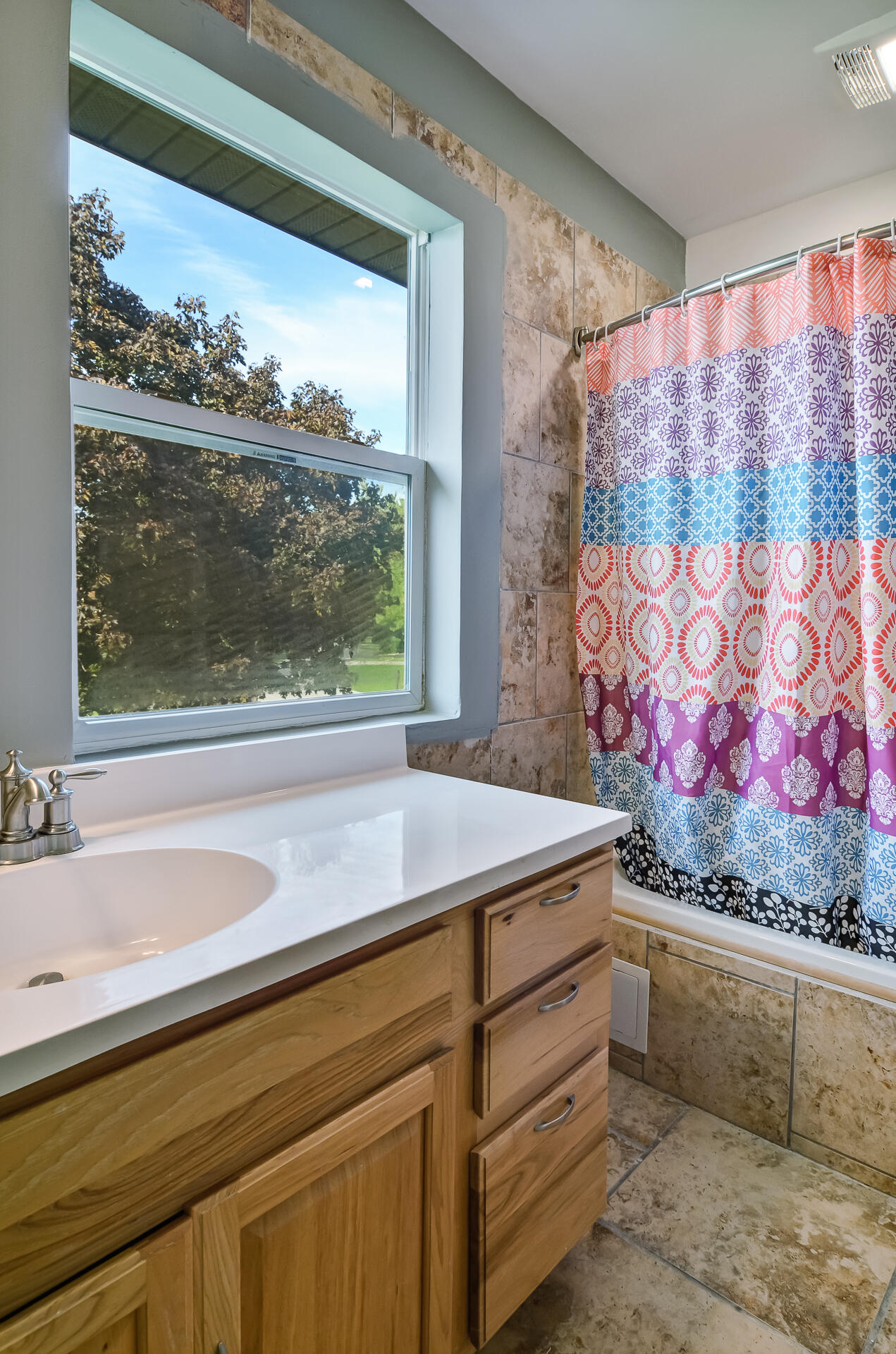 2212 Elm Tree Lane Crown Point, IN 46307 - Photo 27 of 33 a view of bathroom with a sink and mirror