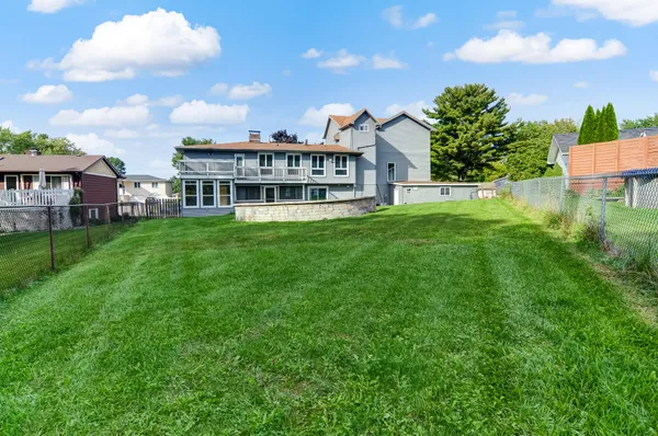 a view of a house with a big yard