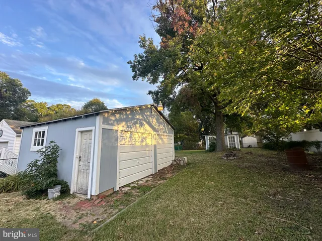 a view of backyard with green space