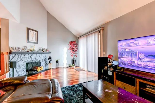 a room with furniture and pool table