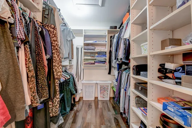 a bathroom with a sink vanity and a mirror