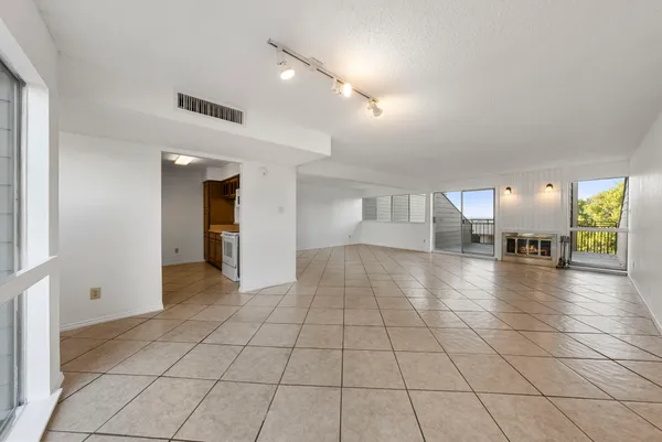 a view of an empty room and window