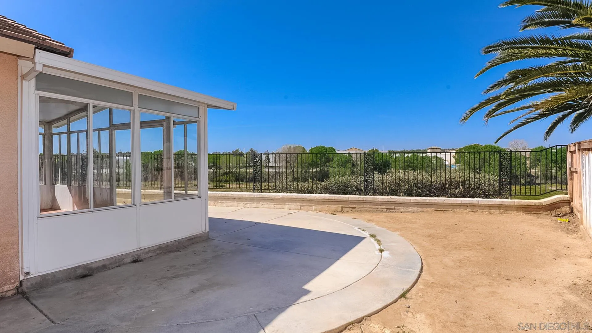 33092 Tulley Ranch Road Temecula, CA 92592 - Photo 22 of 24 a view of a swimming pool with an outdoor seating