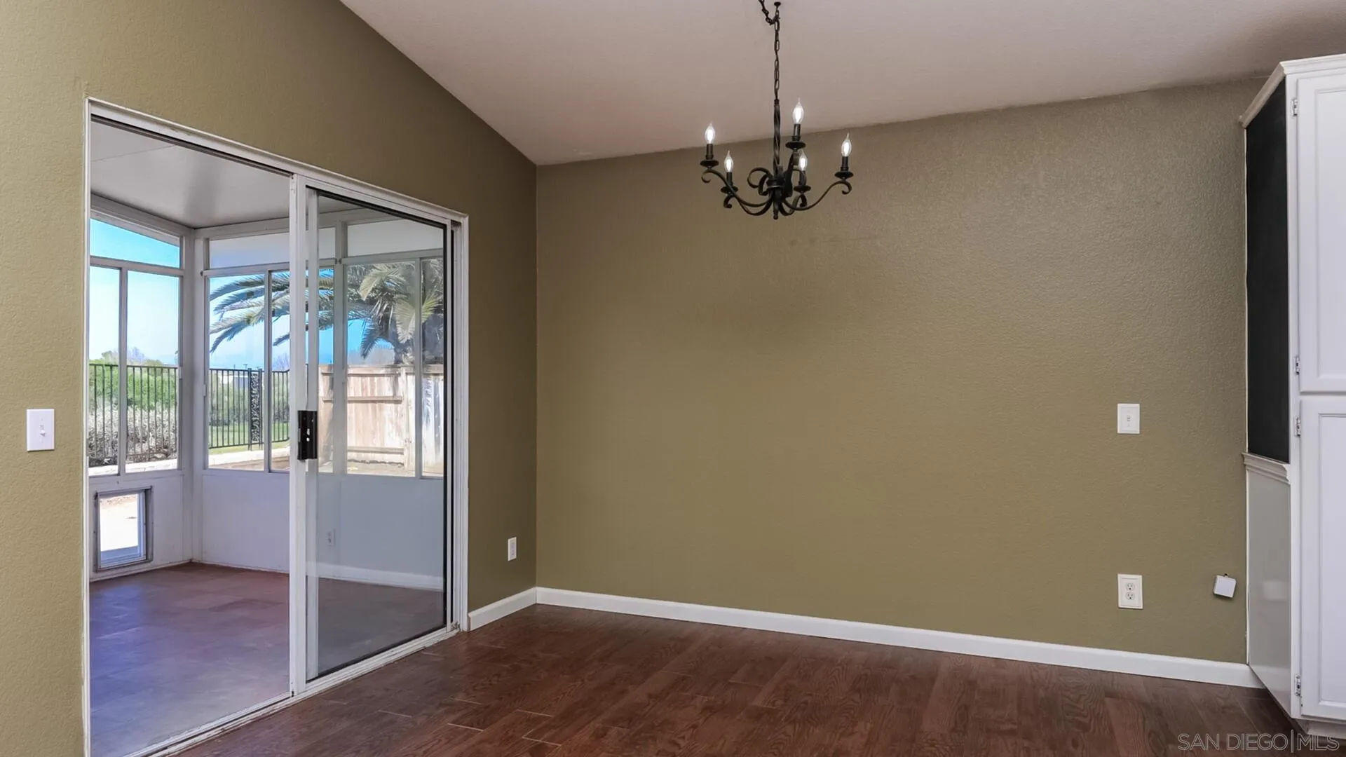 33092 Tulley Ranch Road Temecula, CA 92592 - Photo 8 of 24 a view of a livingroom with a chandelier