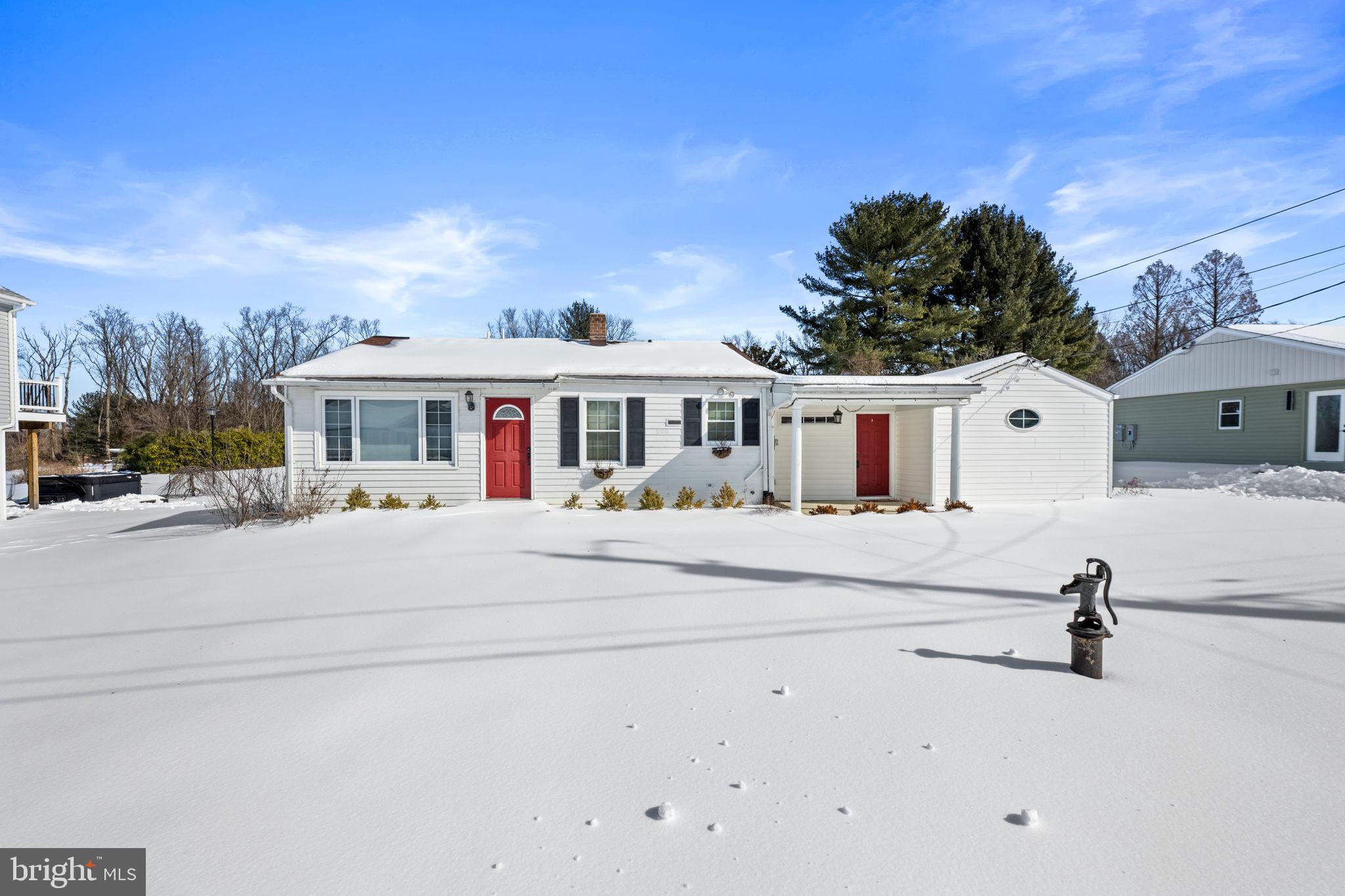 a view of house with yard
