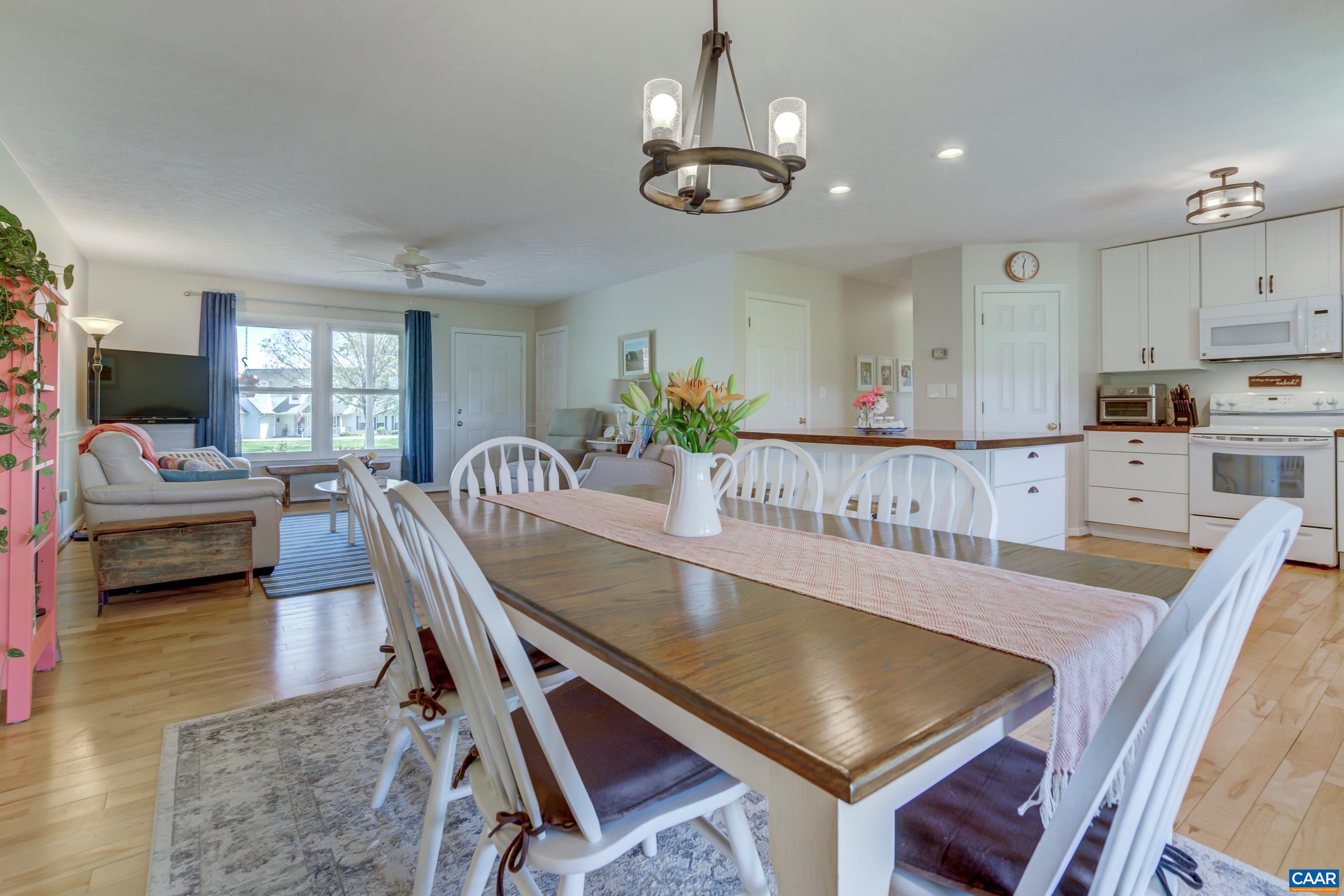 120 Meadowview Lane Ruckersville, VA 22968 - Photo 12 of 53 a living room with stainless steel appliances furniture a rug and a view