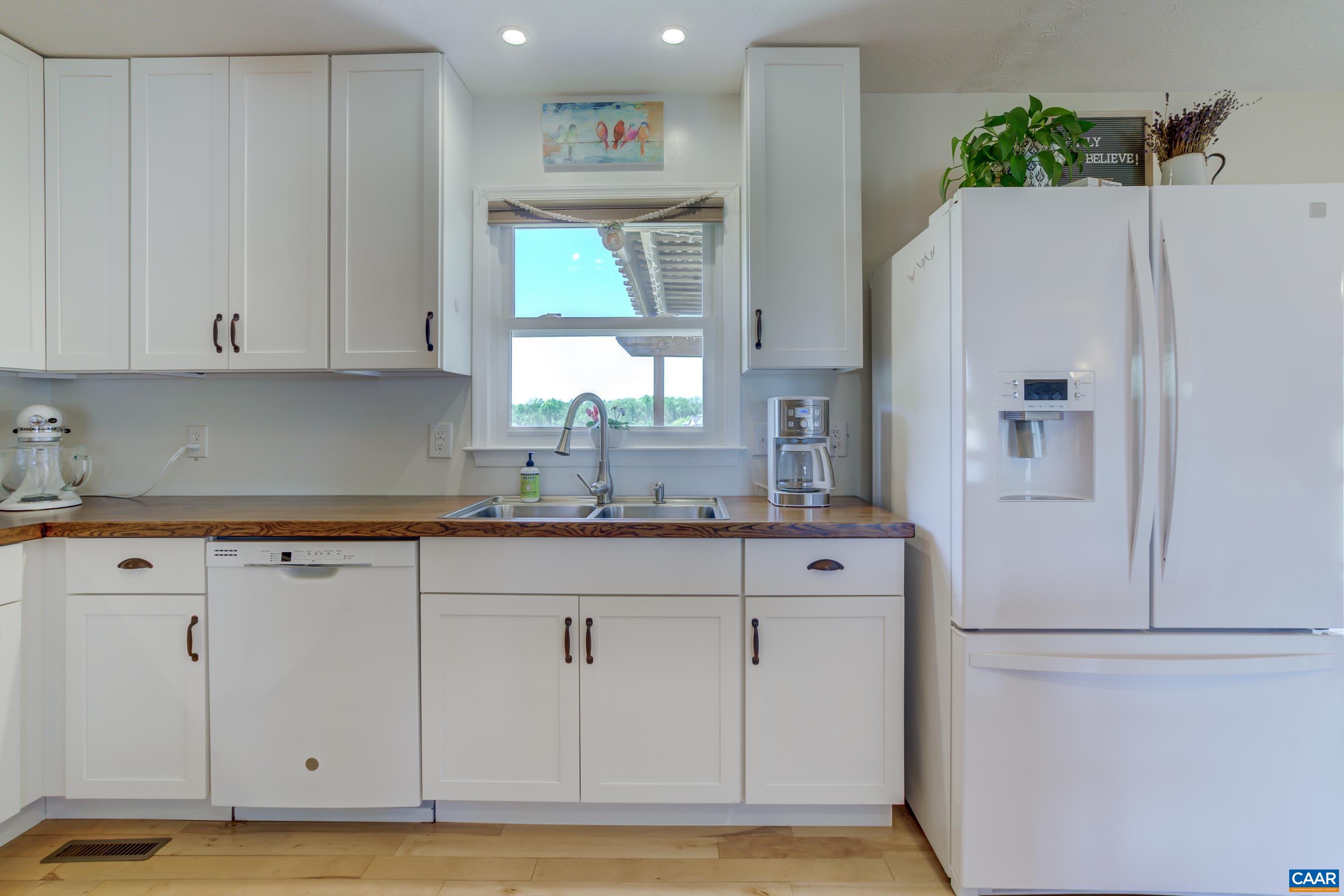 120 Meadowview Lane Ruckersville, VA 22968 - Photo 15 of 53 a kitchen with a sink and cabinets